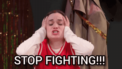 Woman Covering Ears Saying Stop Fighting GIF