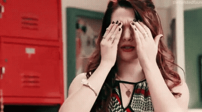 Woman Covering Eyes While Crying GIF
