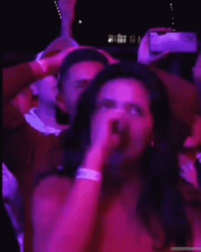 Woman Covering Eyes While Man Photographs GIF