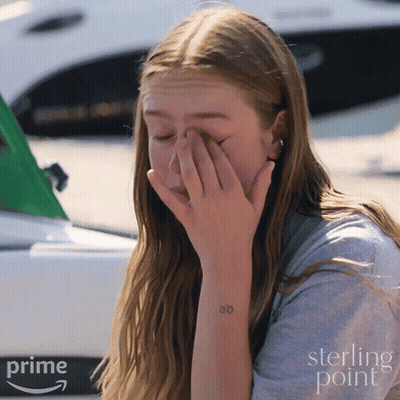 Woman Covering Face In Front Of Boat Saying Sterling Point GIF