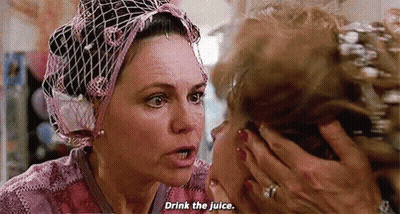 Woman Covering Face Saying Drink The Juice GIF