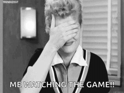 Woman Covering Face Saying Me Watching the Game