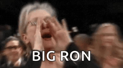 Woman Covering Face While Crowd Applauds GIF