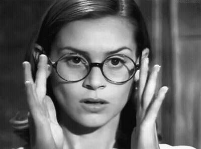 Woman Covering Face With Glasses GIF