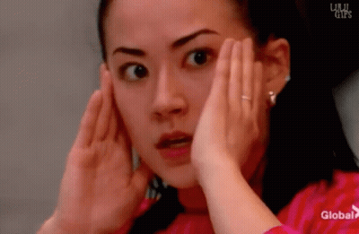 Woman Covering Face With Global Logo GIF