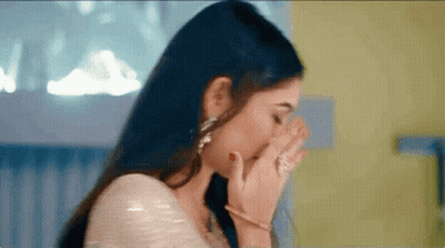 Woman Covering Face With Hand GIF