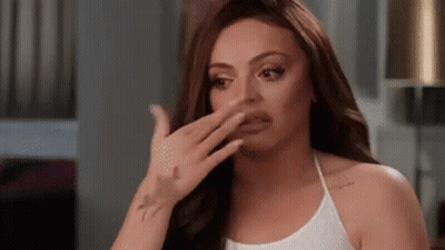 Woman Covering Face With Hand GIF
