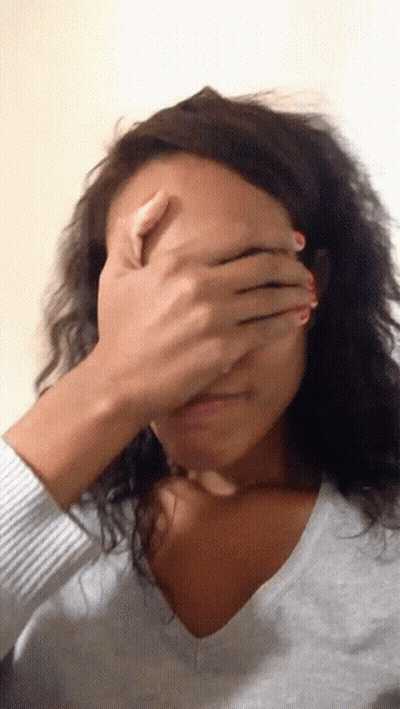 Woman Covering Face With Hand GIF