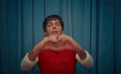 Woman Covering Face With Hands Making Funny Face GIF