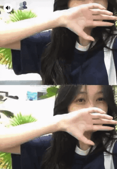 Woman Covering Face With Hands Sound Button Above Head GIF
