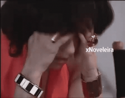 Woman Covering Face With Ring On Finger GIF