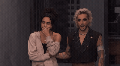 Woman Covering Mouth Beside Man GIF