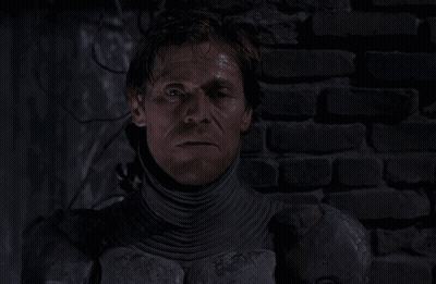 Woman Covering Mouth Holding Bow And Arrow GIF