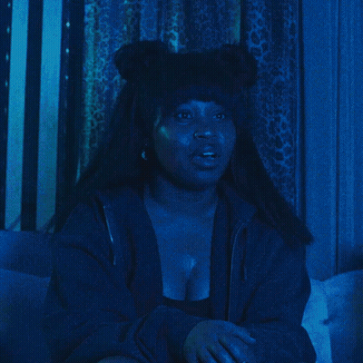 Woman Covering Mouth In Black Jacket GIF
