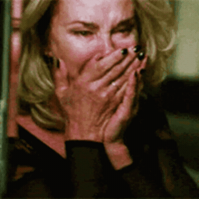 Woman Covering Mouth Laughing GIF