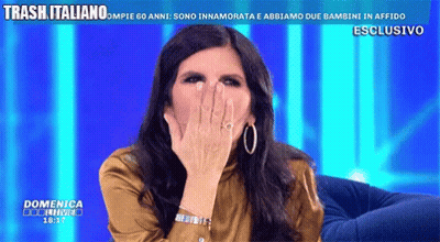 Woman Covering Mouth On TV Saying Trash Italiano GIF