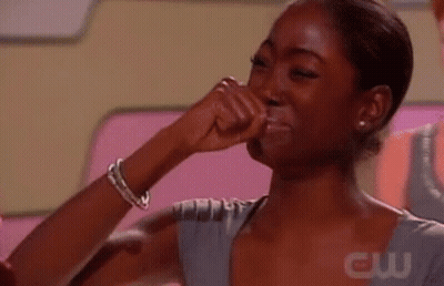 Woman Covering Mouth While Crying GIF