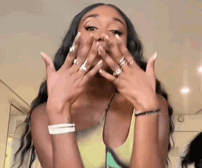 Woman Covering Mouth With Hands And Rings GIF