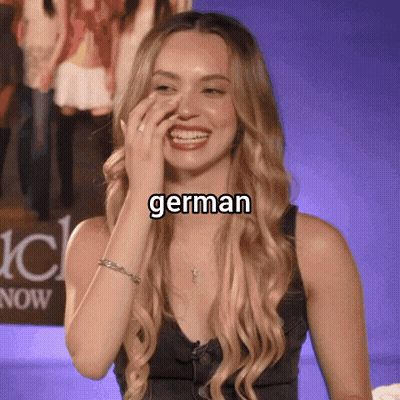 Woman Covering Mouth With Word German Above Head GIF