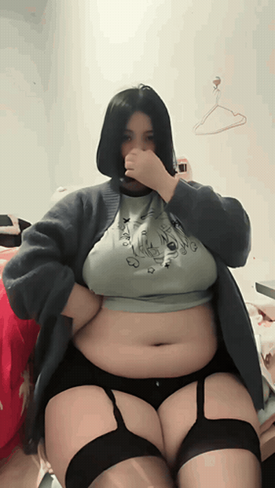 Woman Covering Nose Wearing Shirt Saying X GIF
