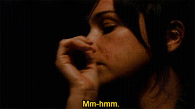 Woman Covering Nose With Hand GIF