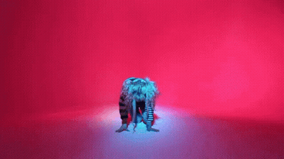 Woman Crawling In Red Neon Light GIF