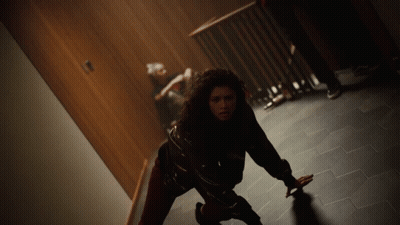 Woman Crawling On Floor In Dark Room GIF