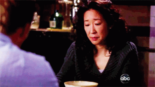 Woman Crying At Table With ABC Logo GIF