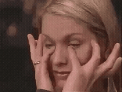 Woman Crying Covering Eyes GIF