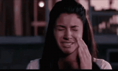 Woman Crying Covering Face With Hands GIF