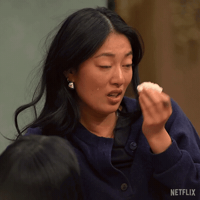 Woman Crying Holding Food Netflix Logo GIF