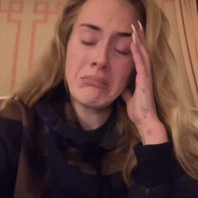 Woman Crying Holding Head GIF