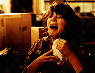 Woman Crying Holding Napkin GIF