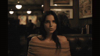 Woman Crying In Dark Room Man At Table GIF