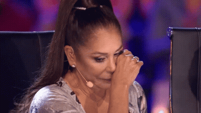 Woman Crying In Front Of Microphone GIF