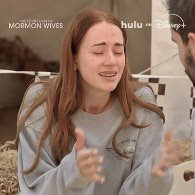 Woman Crying In Front Of Secret Lives Of Mormon Wives Poster GIF