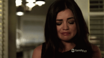 Woman Crying In Room With ABC Family Logo Shirt GIF