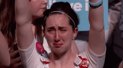 Woman Crying In White Shirt With $15 Sticker GIF