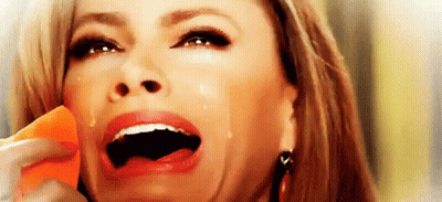 Woman Crying On Cell Phone GIF