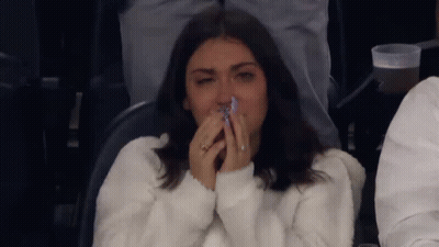 Woman Crying Sitting In Stadium GIF
