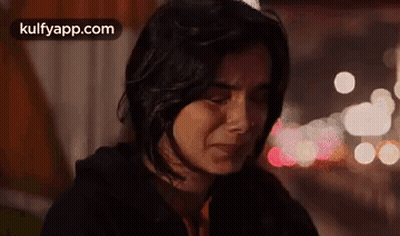 Woman Crying With Eyes Closed GIF