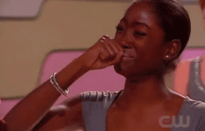 Woman Crying With Fist To Mouth GIF