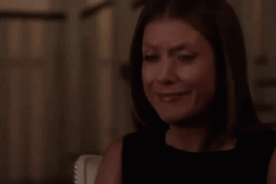 Woman Crying With Tear At Table GIF