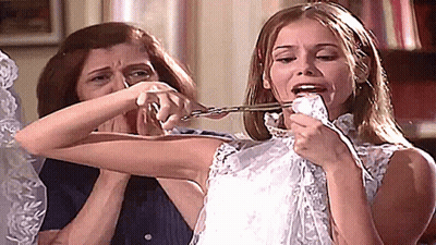 Woman Cutting Bride's Arm With Scissors GIF