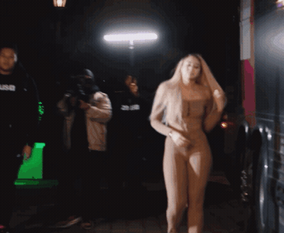 Woman Dancing Before Man In Snr Hoodie GIF