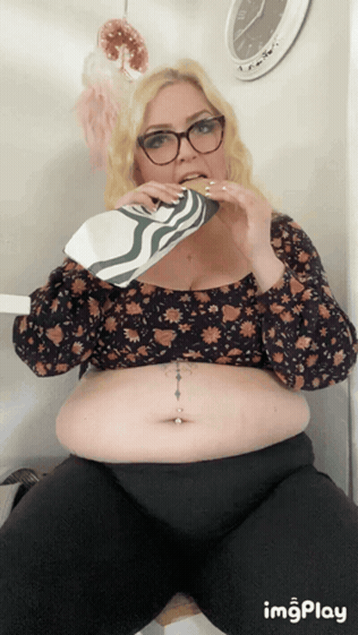 Woman Dancing By Tanzen's Sign GIF