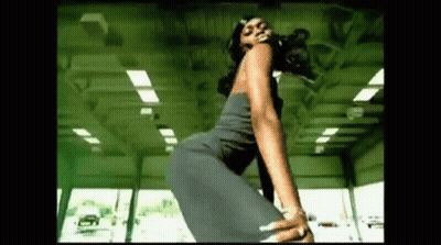 Woman Dancing In Black Dress In Gym GIF