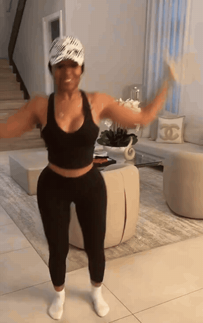 Woman Dancing In Black Tank Top And Leggings GIF