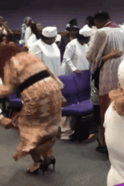 Woman Dancing In Church Crowd GIF