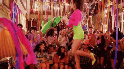 Woman Dancing In Crowd At Party GIF